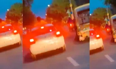 नोएडा में कार की छत पर लेटकर स्टंट करते युवक का वीडियो वायरल, पुलिस ने दिया कार्यवाही का निर्देश