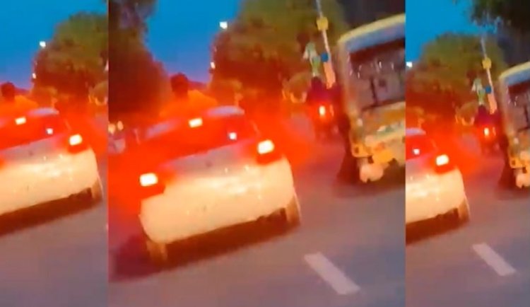 नोएडा में कार की छत पर लेटकर स्टंट करते युवक का वीडियो वायरल, पुलिस ने दिया कार्यवाही का निर्देश